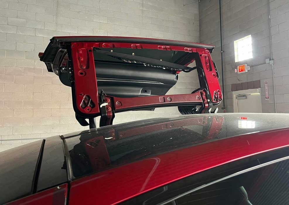 Power sunroof and convertible top repair work in shop