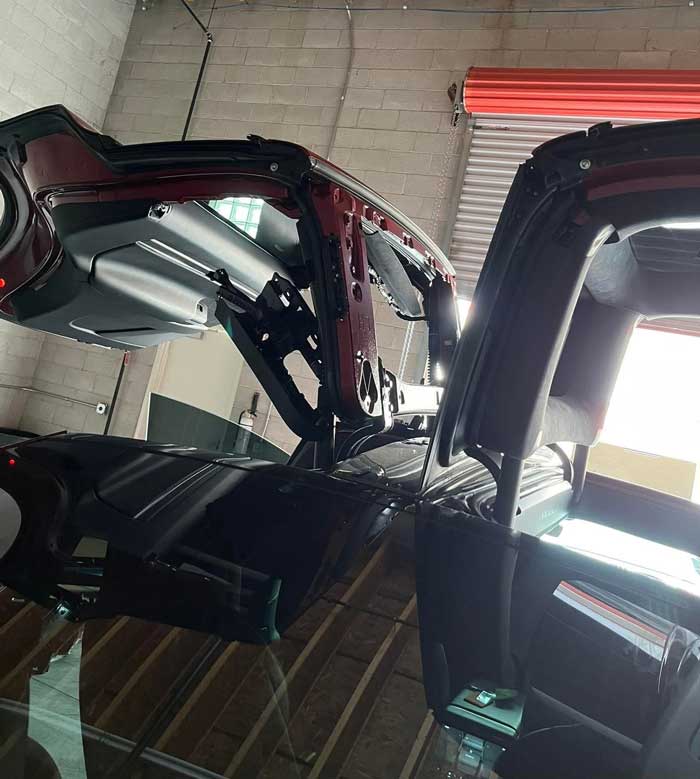 Convertible top and roof repair inside auto glass shop