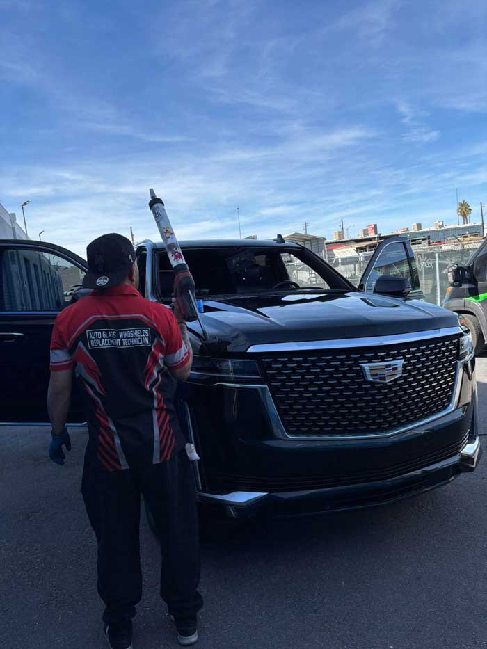 Windshield replacement on green performance vehicle in Las Vegas
